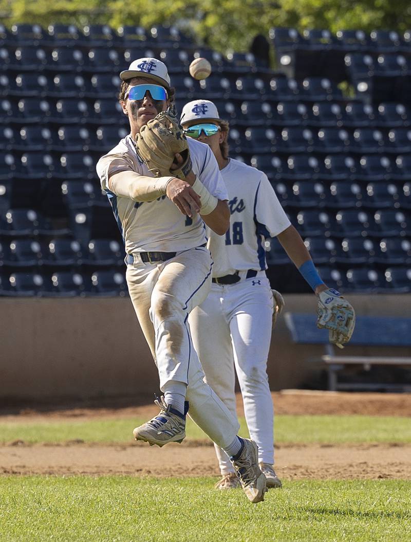 Newman’s Garet Matznick fires a throw to first for an out against Chicago Hope Monday, May 27, 2024 during the Class 2A super-sectional in Rockford.