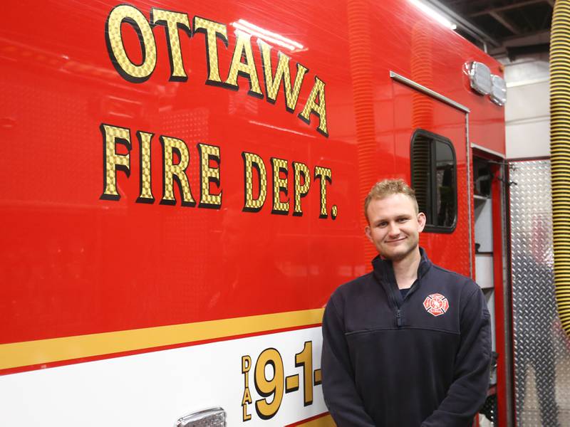 Ottawa firefighter and paramedic Adrian Banat, poses for a photo a photo at the Ottawa Fire Station off of State Street on Thursday, April 18, 2024 in Ottawa.