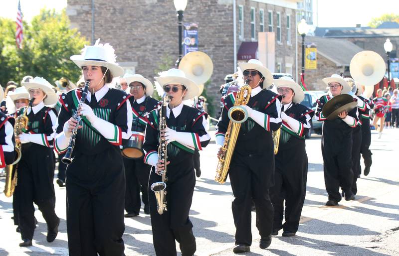 Members of the L-P band play their instruments in the Homecoming parade on Thursday, Oct. 5, 2023 downtown Peru.