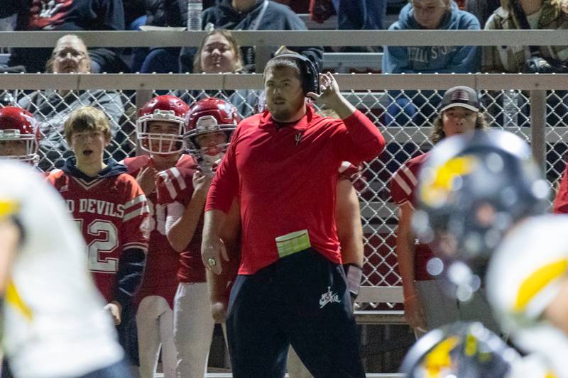 Coach Larson of Hall stands on sideline on Friday, October 18, 2024 at Richard Nesti Stadium in Spring Valley.