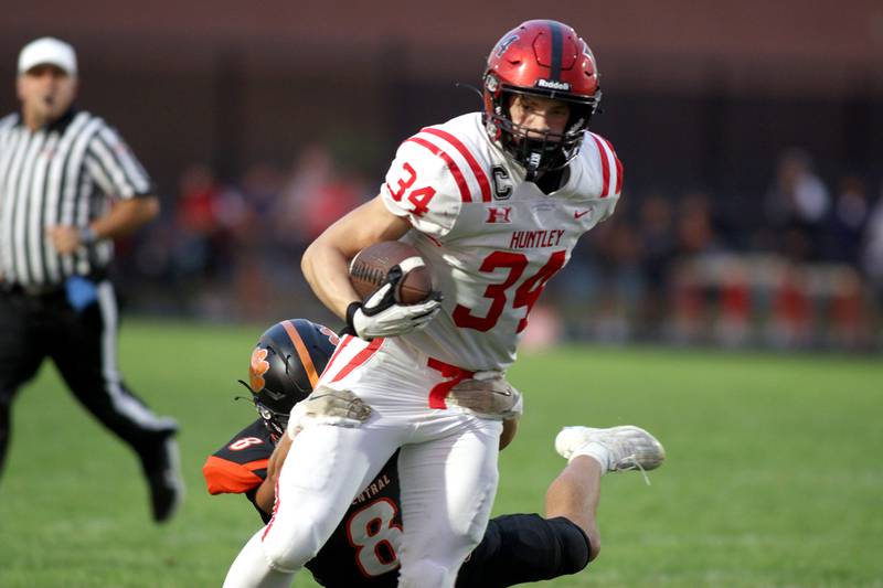 Huntley’s Grant Tucker moves the ball in varsity football on Friday, Aug. 30, 2024, at Metcalf Field on the campus of Crystal Lake Central High School in Crystal Lake.