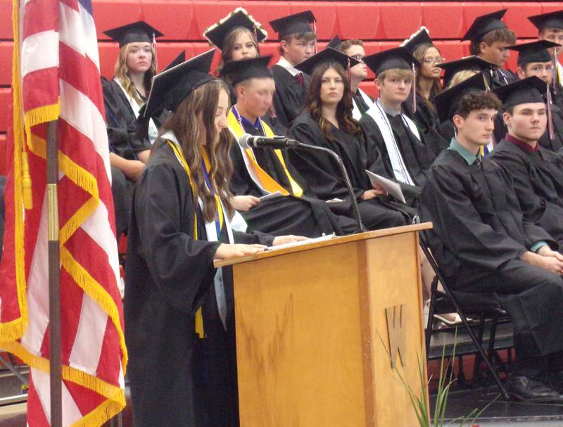 Shae Simons gives the graduate address Sunday, May 19, 2024, to her fellow classmates at the Woodland ceremony.