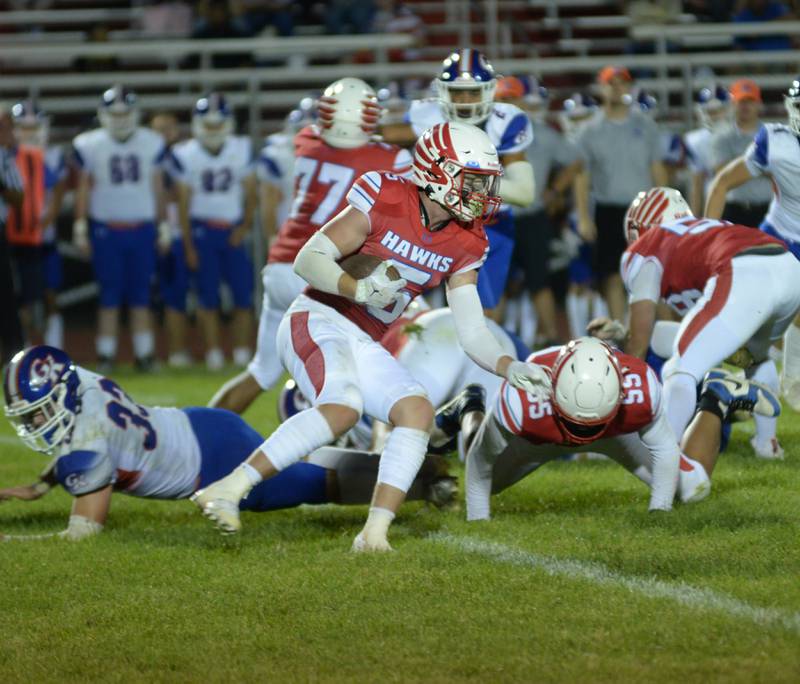 Oregon's Hunter Bartel (5) runs for yards against Genoa-Kingston on Friday, Sept. 13, 2024 at Landers-Loomis Field in Oregon.