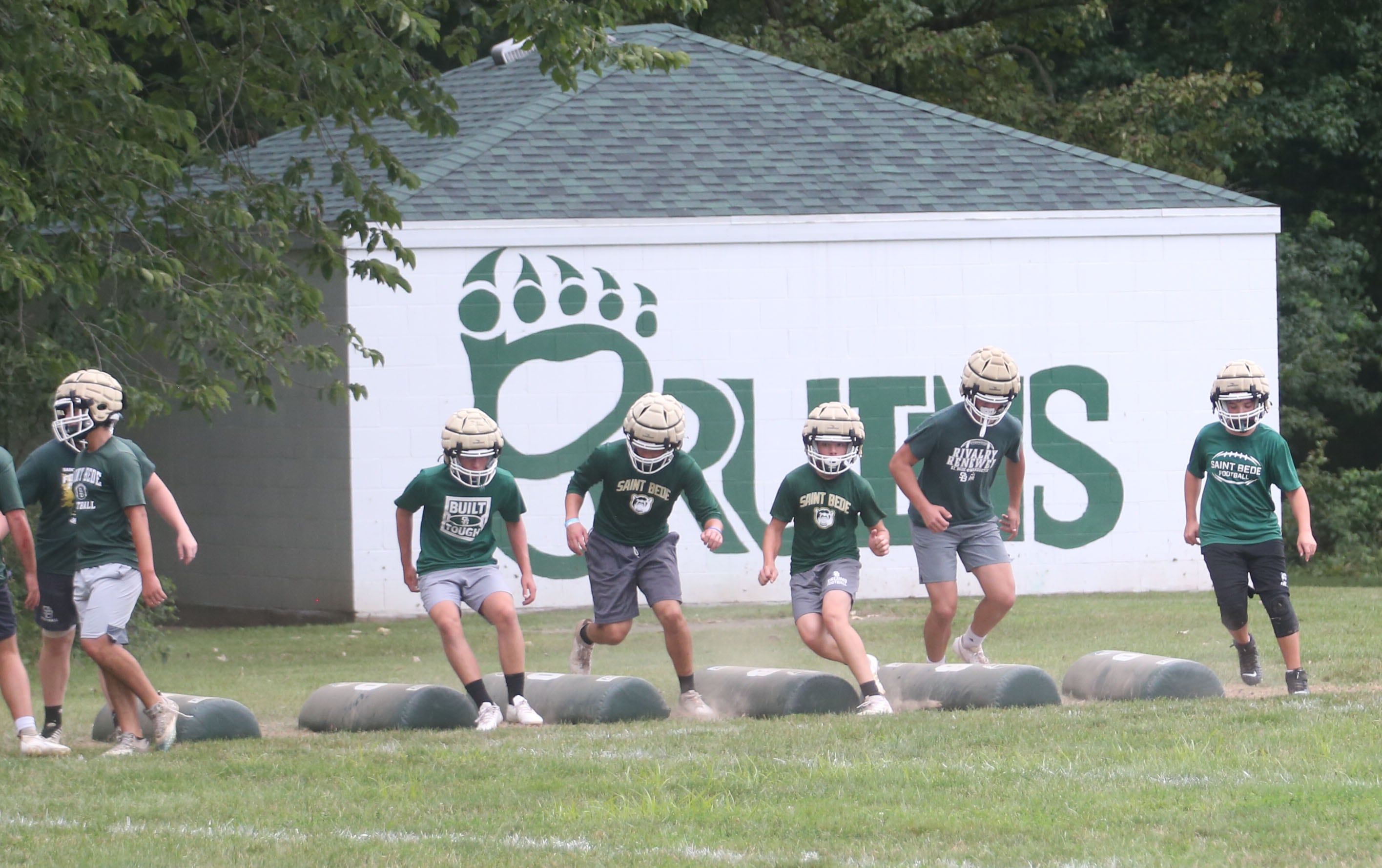 St. Bede players practice bag drills during practice on Monday, Aug. 12, 2024 at St. Bede Academy.