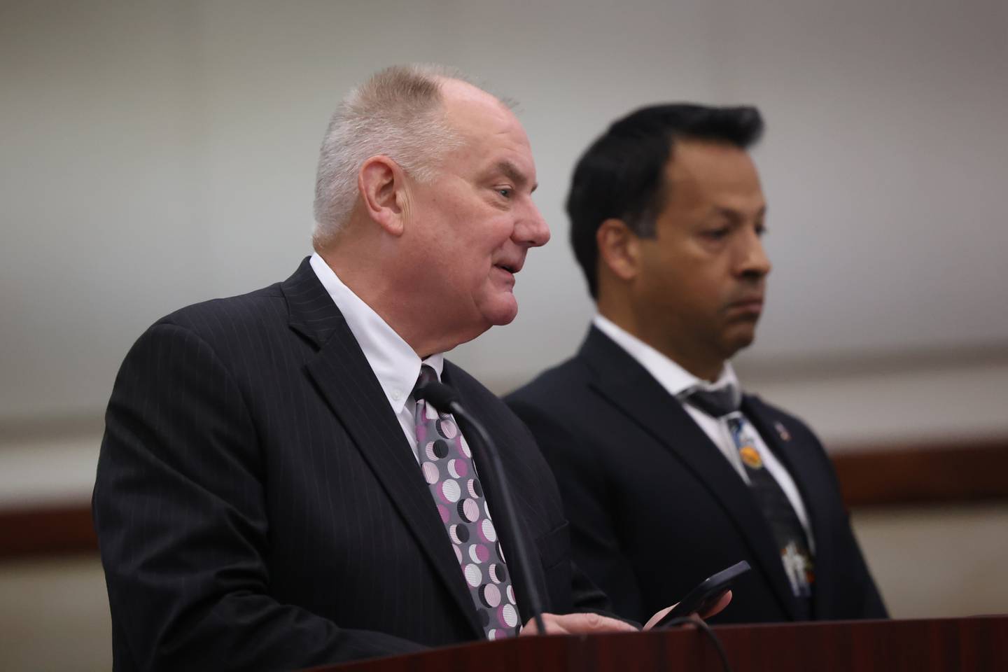 Defense attorney Jeff Tomczak speaks with the judge during a status hearing for Javier Esqueda at the Kendall County Courthouse. Esqueda faces official misconduct charges for leaking video of Eric Lurry’s arrest. Lurry died from a drug overdose. Tuesday, June 14, 2022 in Yorkville.