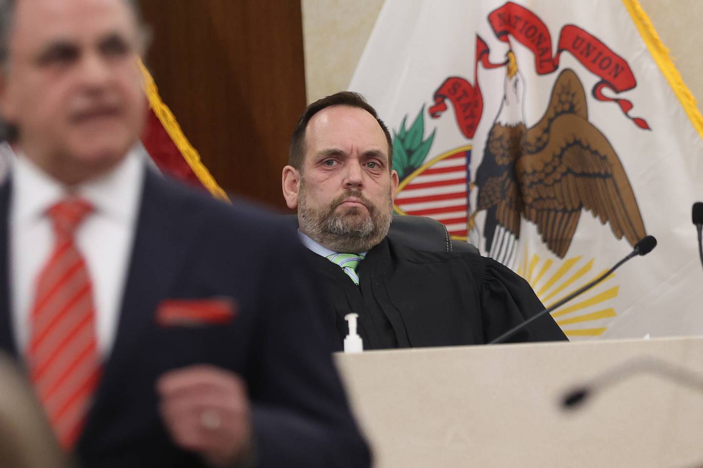 Judge Dan Rippy listens to Defense lawyer George Lenard makes closing arguments on Monday in the case against Sean Woulfe at the Will County Courthouse. Sean Woulfe, 29, is charge with reckless homicide of Lindsey Schmidt, 29, and her three sons, Owen, 6, Weston, 4, and Kaleb, 1. Monday, Mar. 28, 2022, in Joliet.