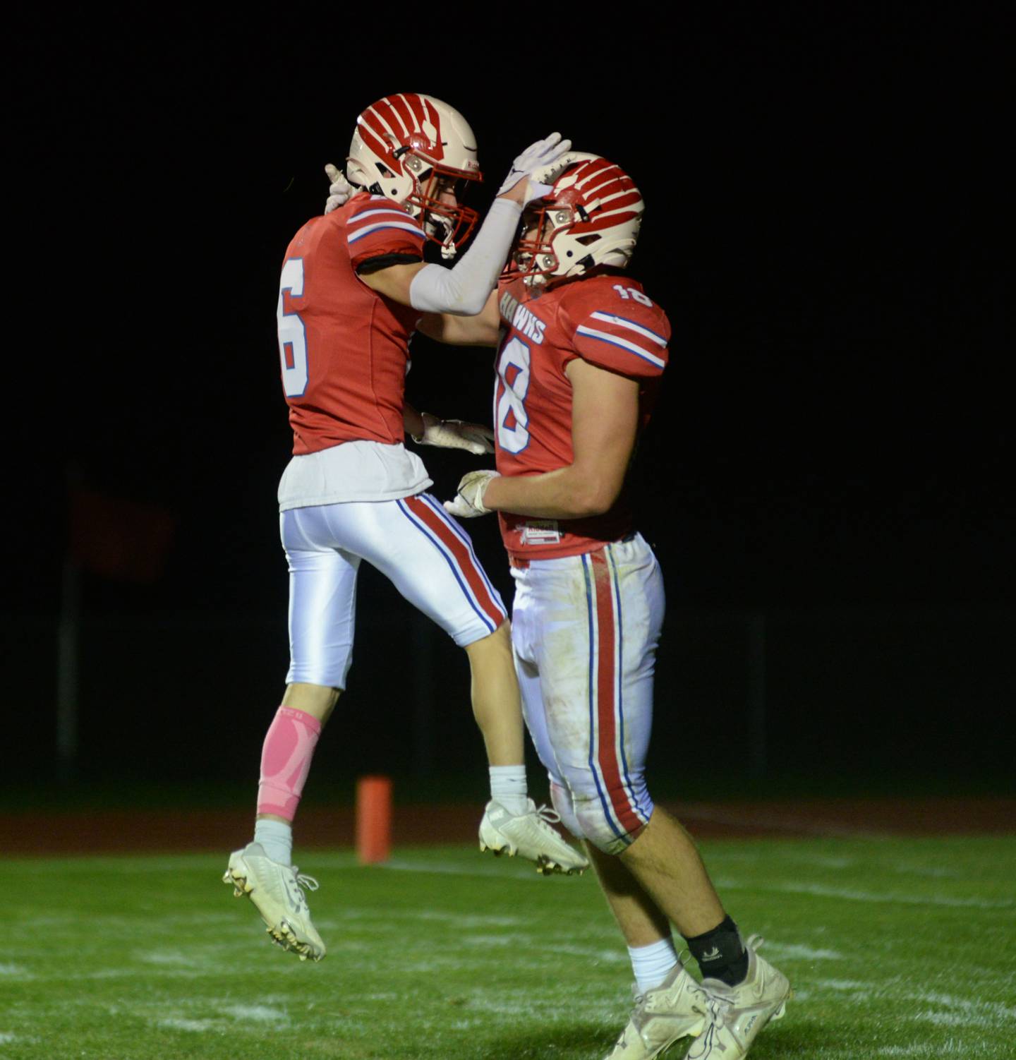 Oregon's Griffin Marlatt (6) and Josh Crandall (18) celebrate after a score during Friday, Oct. 6, 2023 game with Rock Falls at Oregon High School's Landers-Loomis Field.