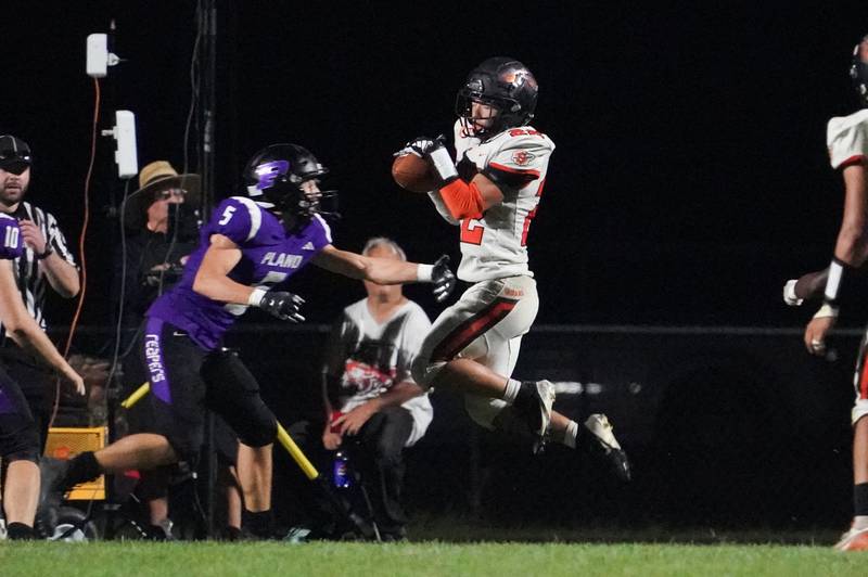 Sandwich’s Kai Pon (22) catches a pass against Plano during a football game at Plano High School on Friday, Sep 13, 2024.