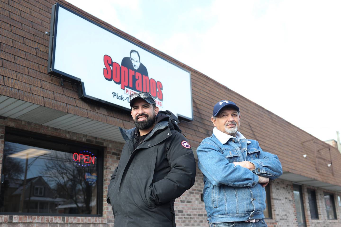 Manny Serma, owner of Sopranos Pizzeria and Catering, and his father Hector Serma stand outside the Lockport location on Thursday, Jan. 11th, 2024 in Lockport.