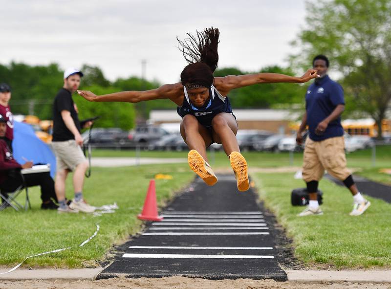 Plainfield South's Jahnel Bowman competes in the triple jump during the 3A Minooka Sectional on Wednesday, May 8, 2024.