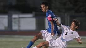 Photos: West Chicago vs. St. Charles North in boys soccer