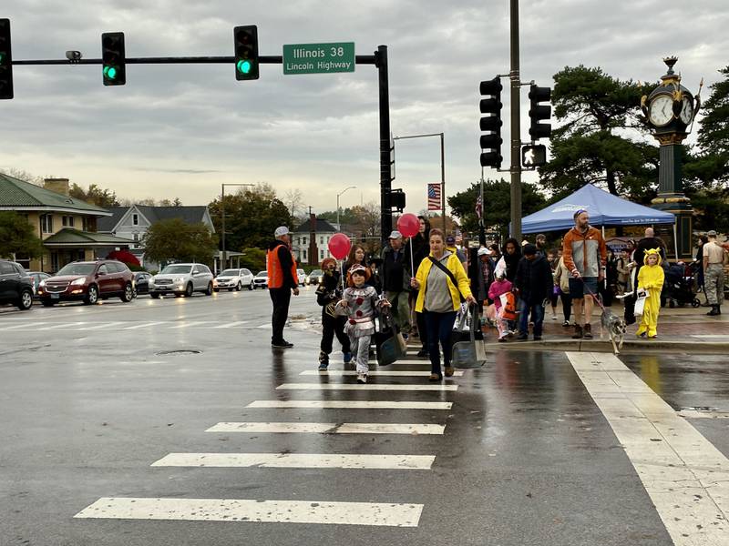 Costume-clad families took downtown DeKalb by storm Thursday, Oct. 26, 2023 for the 26th annual Spooktacular trick-or-treating event hosted by the DeKalb Chamber of Commerce.