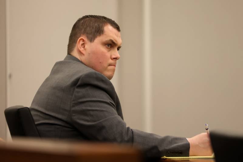 Jeremy Boshears, 36, takes notes during opening comments. Boshears is charged with the murder of Kaitlyn “Katie” Kearns, 24, on Nov. 13, 2017. Thursday, April 14, 2022, in Joliet.