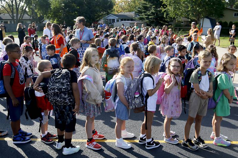 Students line up for the first day of school on Wednesday, Aug. 21, 2024, at Coventry Elementary School in Crystal Lake.