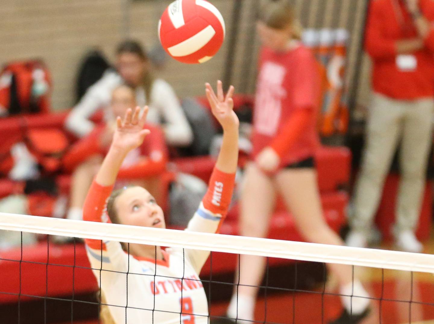 Ottawa's Skylar Dorsey sets the ball in the air against L-P on Thursday, Oct. 17, 2024 in Kingman Gym at Ottawa High School.