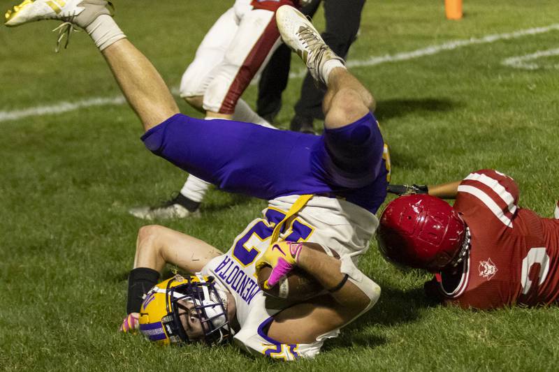 Braiden Freeman of Mendota High School makes a rolling catch in the endzone to score a touchdown against Hall High School at Richard Nesti Stadium on September 13, 2024.