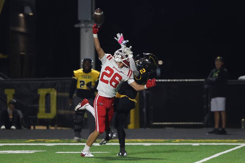 Yorkville’s Daniel Kraus breaks up the pass intended for Joliet West’sGerard Bush on Friday, Sept. 13, 2024 in Joliet.