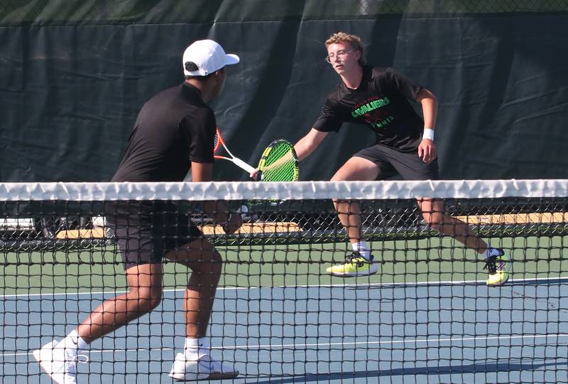 The La Salle-Peru No. 1 doubles team of Danny Santoy (at net) and Andrew Bollis play against Ottawa at the Henderson-Guenther Tennis Facility on Monday, May 6, 2024, at Ottawa High School.