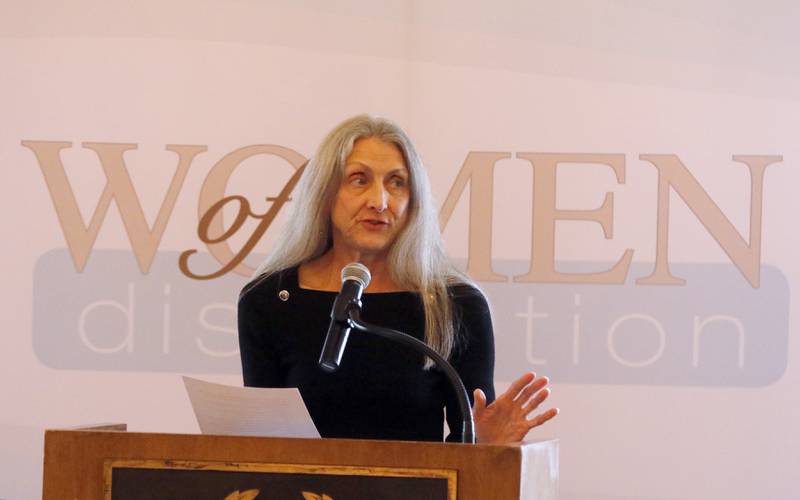 Award recipient Carolyn Campbell speaks during the Northwest Herald's Women of Distinction award luncheon Wednesday June 5, 2024, at Boulder Ridge Country Club, in Lake in the Hills. The luncheon recognized 11 women in the community as Women of Distinction.