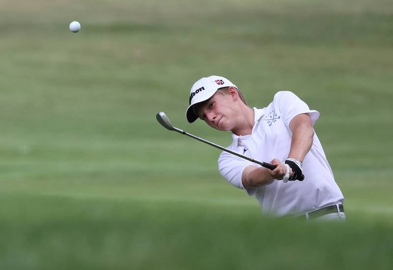 Geneva’s Brandon Burggraf chips onto the green on the par three fourth hole Monday, Sept. 16, 2024, during the Mark Rolfing Cup at the Kishwaukee Country Club in DeKalb.