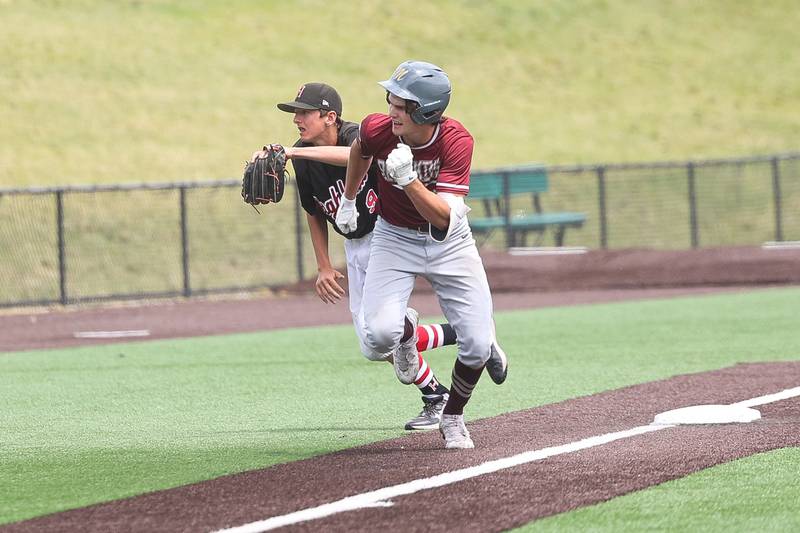 Morris’ A.J. Zweeres heads home for the game winning run on a wild throw against Highland in the IHSA Class 3A 3rd place game on Saturday June 8, 2024 Duly Health and Care Field in Joliet.