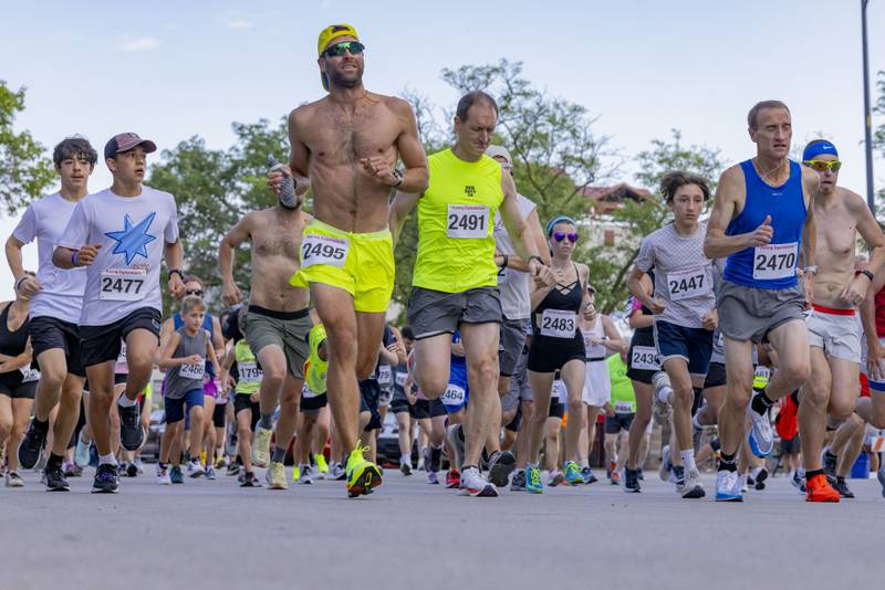 Runners begin the 5k race Friday, June 21, 2024, during Celebrate La Salle.