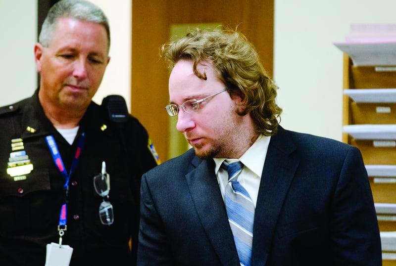 Matthew Welling is escorted into the Lee County courtroom Wednesday for sentencing.  Welling was sentenced to 60 years on the first-degree murder of Delmar "Leroy" Daniels, and 30 years on the count of home invasion.