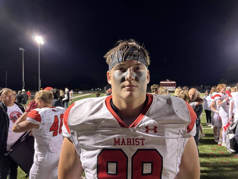 Marist's Brad Fitzgibbon helped lead the RedHawks to a 34-27 overtime win over Brother Rice on Friday night in Chicago.