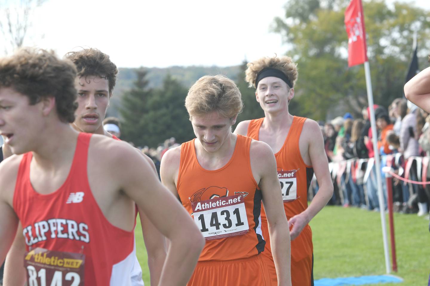 Sandwich's Wyatt Miller and Max Cryer cross the finish line at the Class 1A Oregon Cross Country Sectional on Saturday.