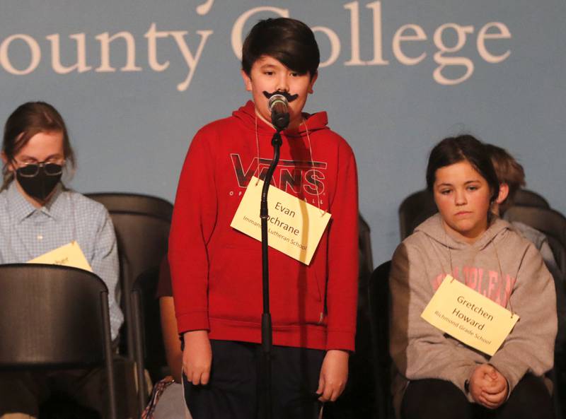Evan Cochrane of Immanuel Lutheran School in Crystal Lake competes in the McHenry County Regional Office of Education's 2023 spelling bee Wednesday, March 22, 2023, at McHenry County College's Luecht Auditorium in Crystal Lake.