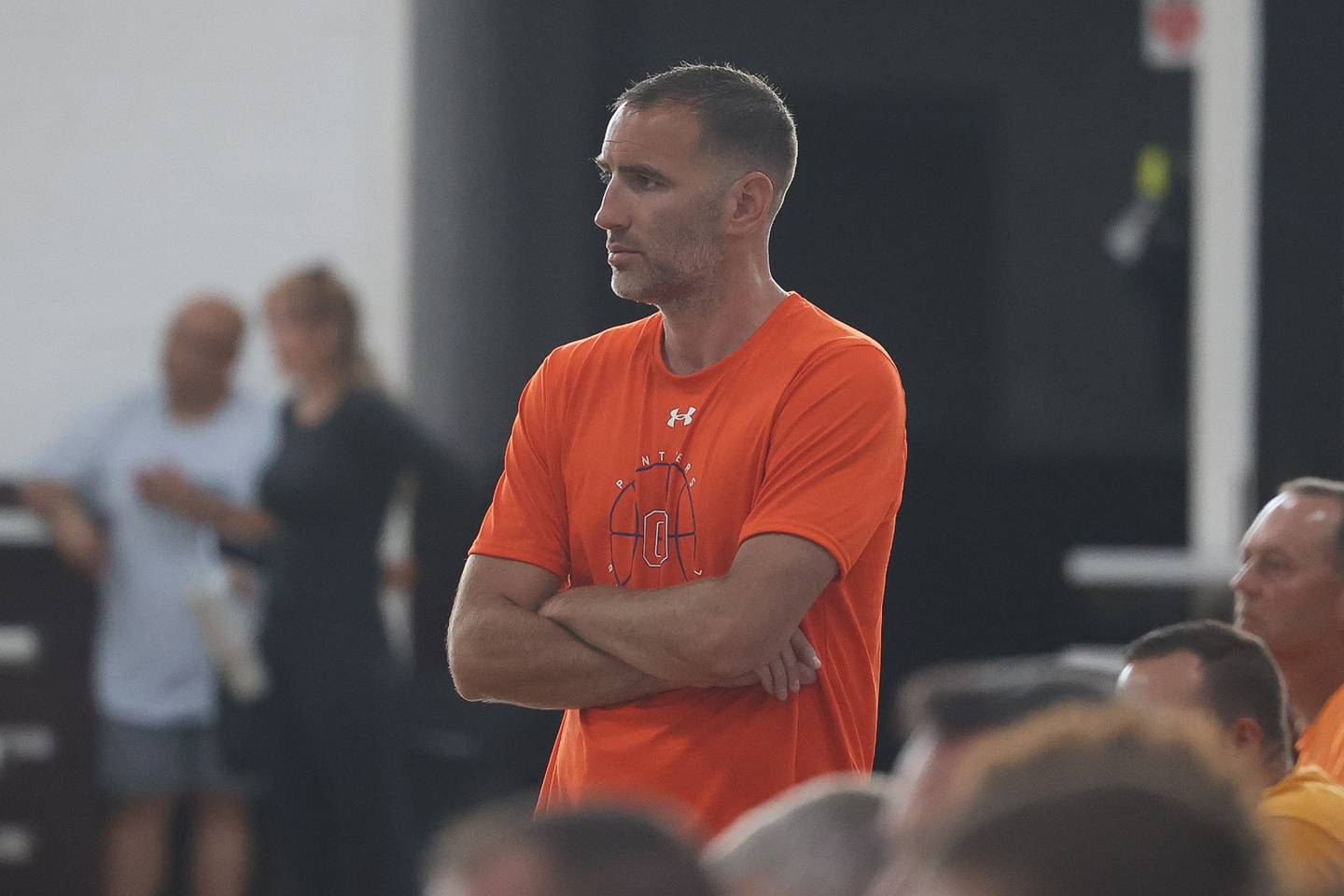 Oswego head coach Nick Oraham watches the game against Central Catholic at the 37th Morris Boys Shootout on Tuesday, June 25, 2024.