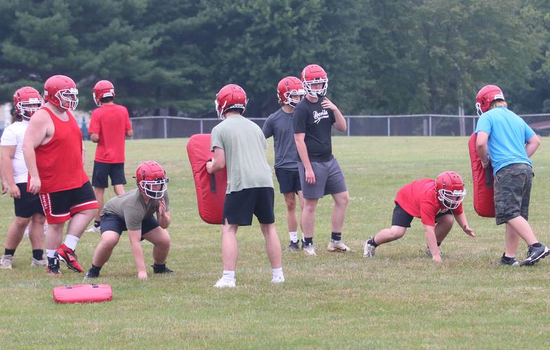 Hall football players practice on Tuesday, July 9, 2024 at Hall High School.