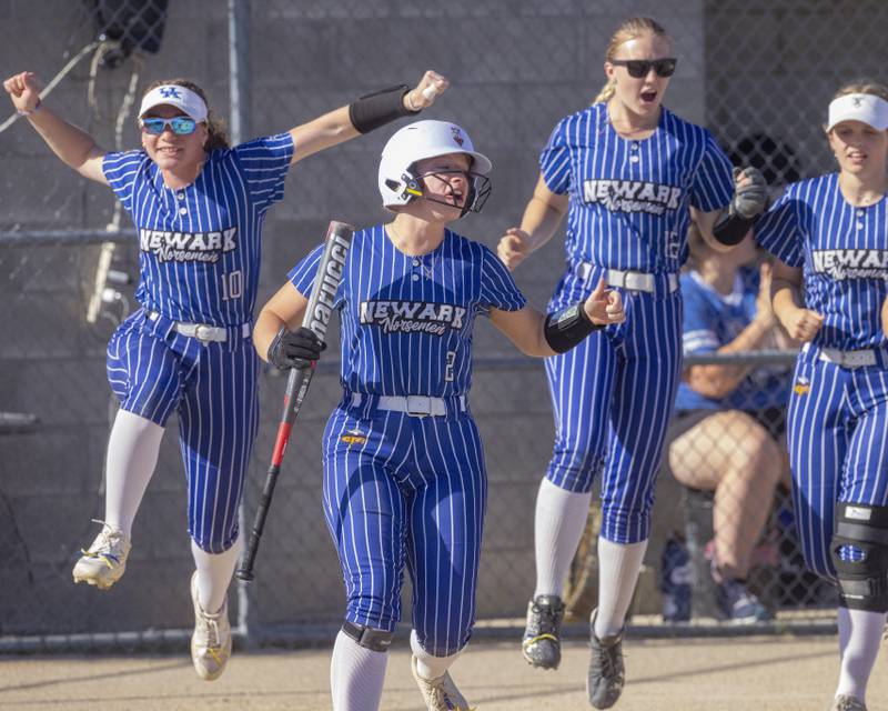 Newark players react to the three run homerun hit by Kodi Rizzo to score the first three points of the Class 1A Sectional Semifinal game against Grant Park, at Woodland High School on May 22, 2024.