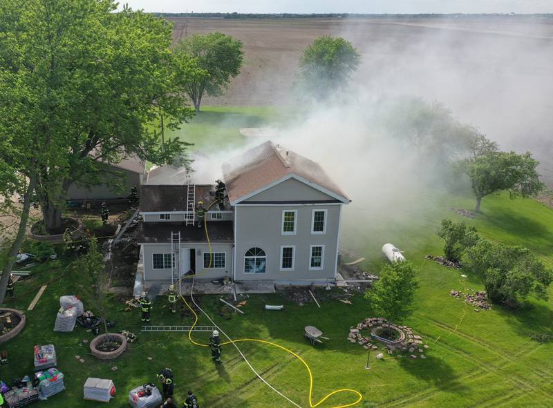 Tonica, Peru, Utica, Grand Ridge, Leonore and Oglesby fire departments work the scene of a structure fire in the 1900 block of East 8th Road on Wednesday, May 8, 2024 near Tonica. The fire happened just before 3:30p.m.