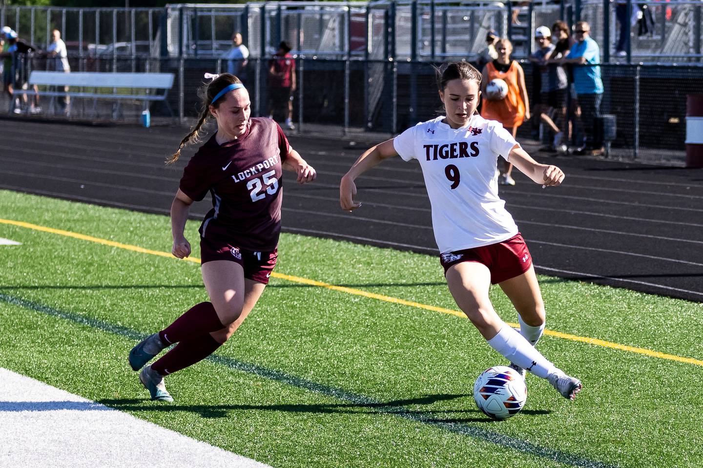 Plainfield North's Sara Anghel makes a move against Lockport's Kaylin Klutcharch during the Class 3A Sectional at Plainfield North on May 22, 2024.