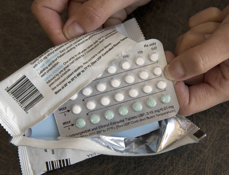 FILE - A one-month dosage of hormonal birth control pills is displayed in Sacramento, Calif., Aug. 26, 2016. A drug company is seeking U.S. approval for the first-ever birth control pill that women could buy without a prescription. The request from a French drugmaker sets up a high-stakes decision for the Food and Drug Administration amid the political fallout from the Supreme Court's recent decision overturning Roe v. Wade. (AP Photo/Rich Pedroncelli, File)