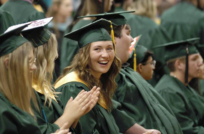 Claire Bickett smiles at the crowd during graduation ceremonies Sunday, May 26, 2024, at Rock Falls High School.