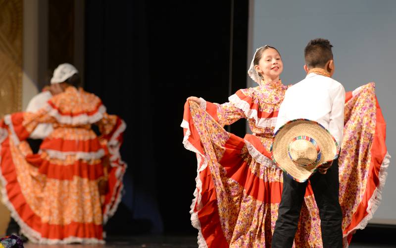 Various grade levels and schools including Victoria Martinez of Forest Road Elementary School perform in the La Grange District 102 Expo de Bellas Artes at Park Junior High School Friday, April 19, 2024.