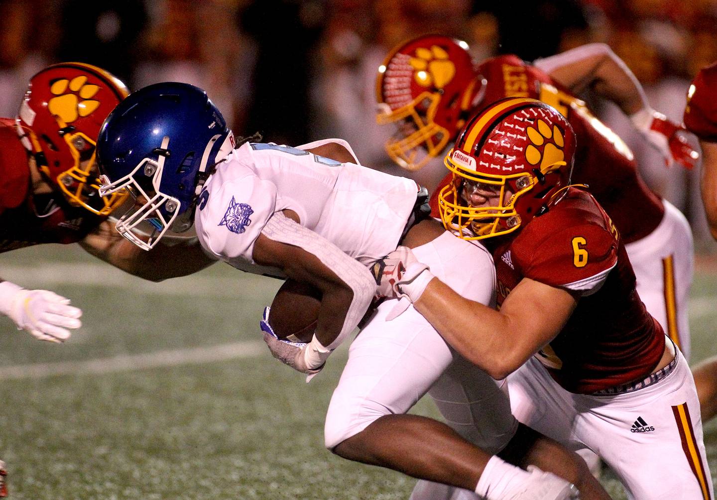 Batavia's Jack Sadowsky (6) takes down Phillips' Dayvone Rainey during the first game of the season in Batavia on Friday, Aug. 27, 2021.