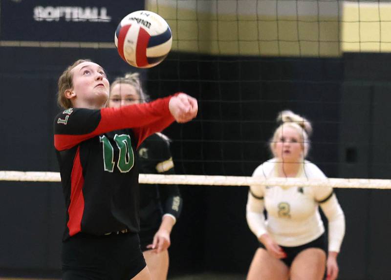 LaSalle-Peru's Katie Sowers bumps the ball during their match Tuesday, Oct. 10, 2023, at Sycamore High School.