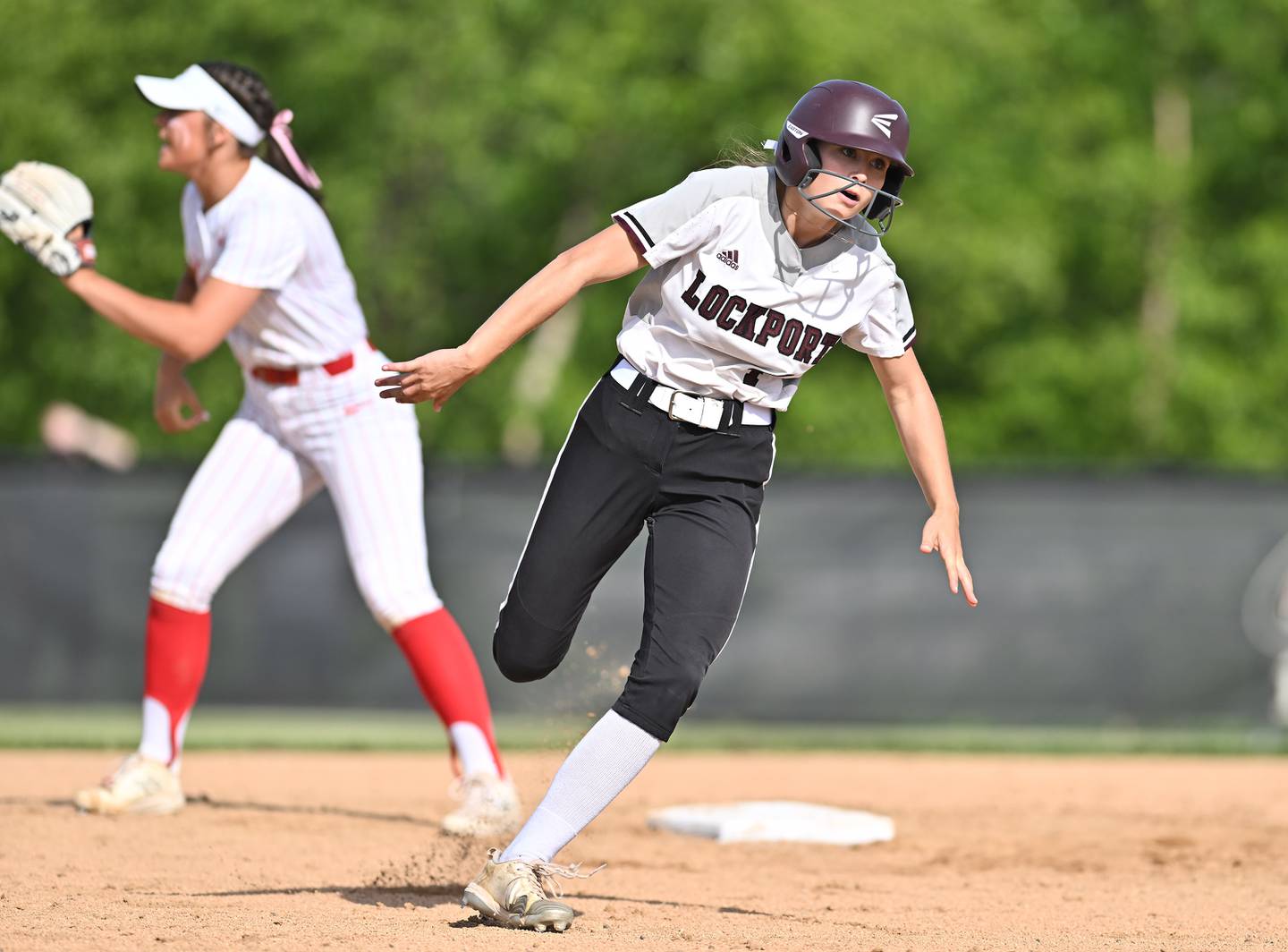 Lockport's Rheanna Slavicek running to third base during the Class 4A Lincoln-Way Central sectional championship game against Lincoln-Way Central on Friday, May 31, 2024 at New Lenox.