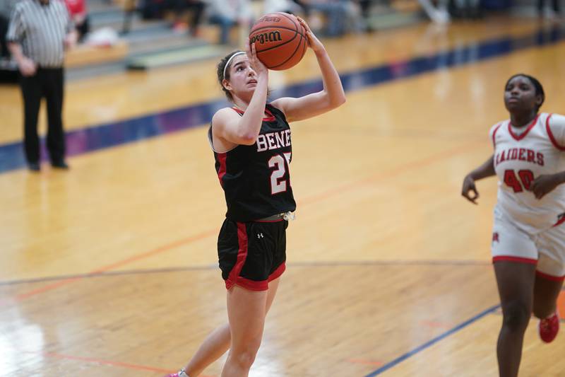 Benet’s Shannon Earley (25) shoots the ball in the post off of a fast break against Bolingbrook during a Oswego semifinal sectional 4A basketball game at Oswego High School on Tuesday, Feb 20, 2024.
