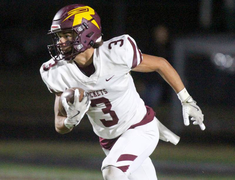 Richmond Burton’s Oscar Bonilla, Jr. runs the ball in varsity football at Rod Poppe Field on the campus of Marengo High School in Marengo on Friday, Oct. 18, 2024.