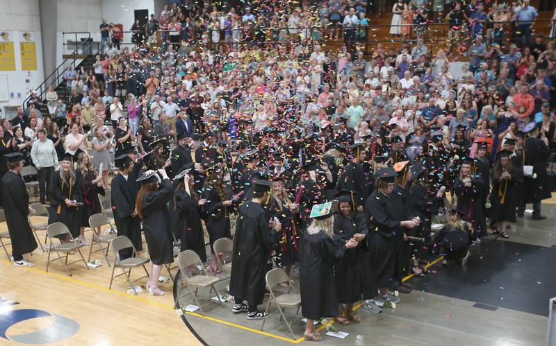 Putnam County High School graduates let go of confetti during graduation on Sunday, May 19, 2024 at Putnam County High School.