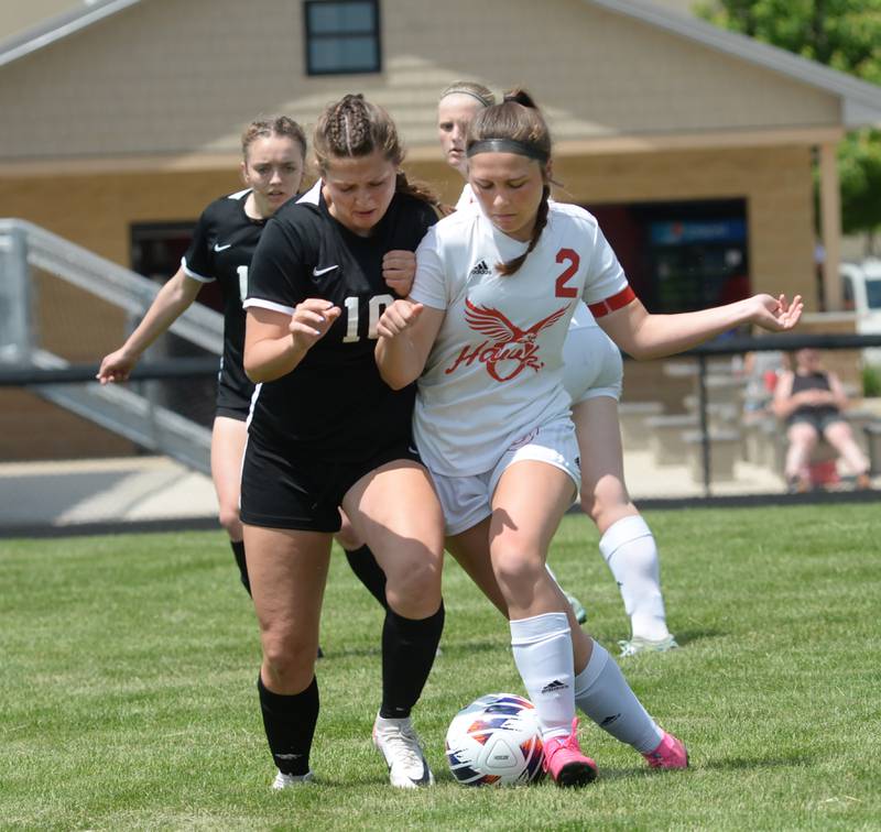 Oregon's Anna Stender (2) and Stillman Valley's Olivia Voltz battle for the ball during the 1A Indian Creek Sectional on Saturday, May 18, 2024. Stillman Valley won the game 2-1 to advance to the sectional championship.