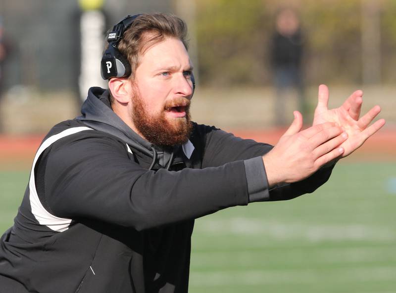 Fenwick head coach Matt Battaglia calls a time out during their IHSA Class 5A state semifinal game against Sycamore Saturday, Nov. 20, 2021, at Triton College in River Grove.