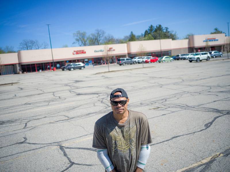 Vernon L. Brooks Jr. stands at the spot where he was arrested in McHenry, Illinois, on April 25, 2024.