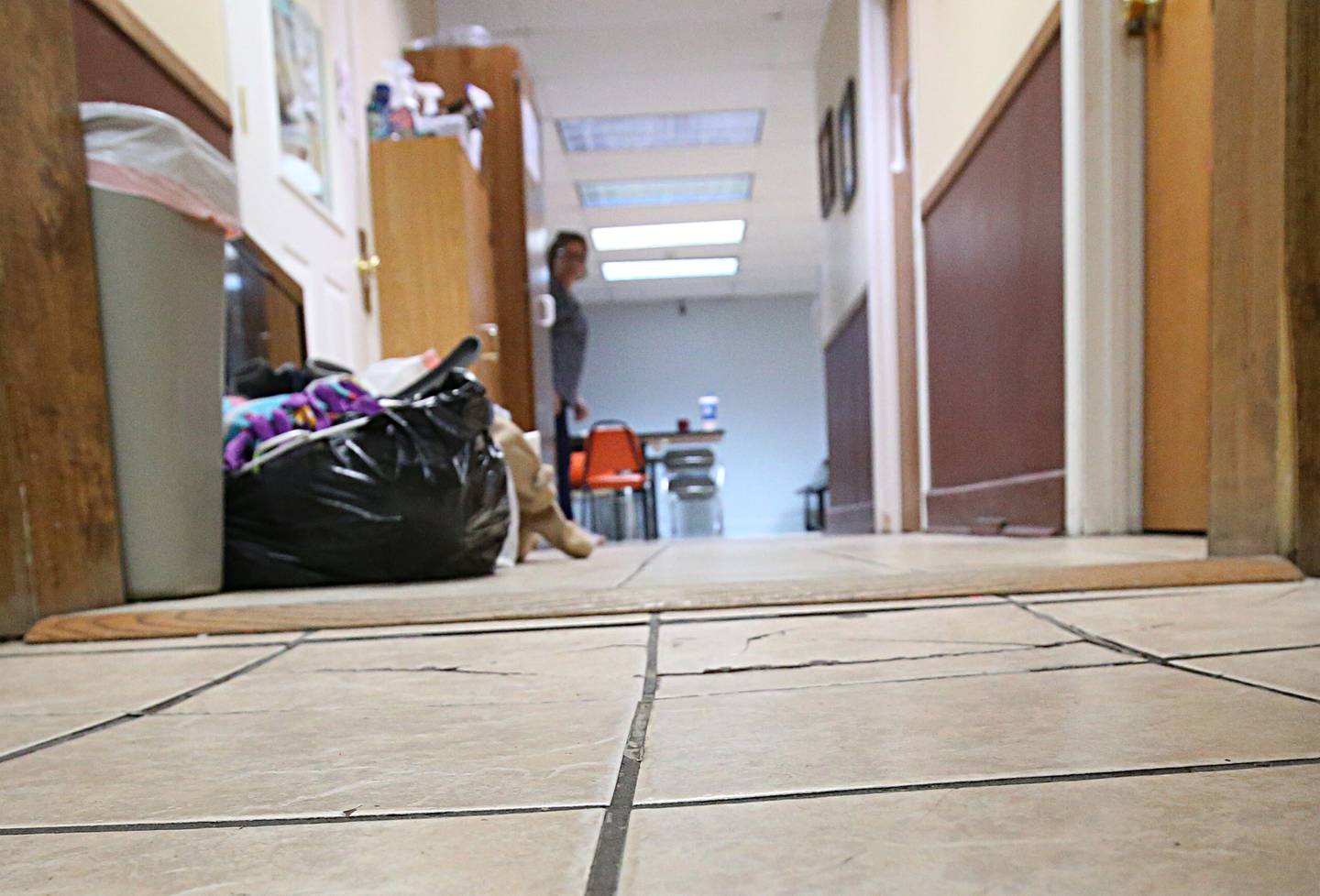 A sunken floor can be seen in the hallway outside the family room at the Public Action to Deliver Shelter on Tuesday, May 28, 2024, in Ottawa.