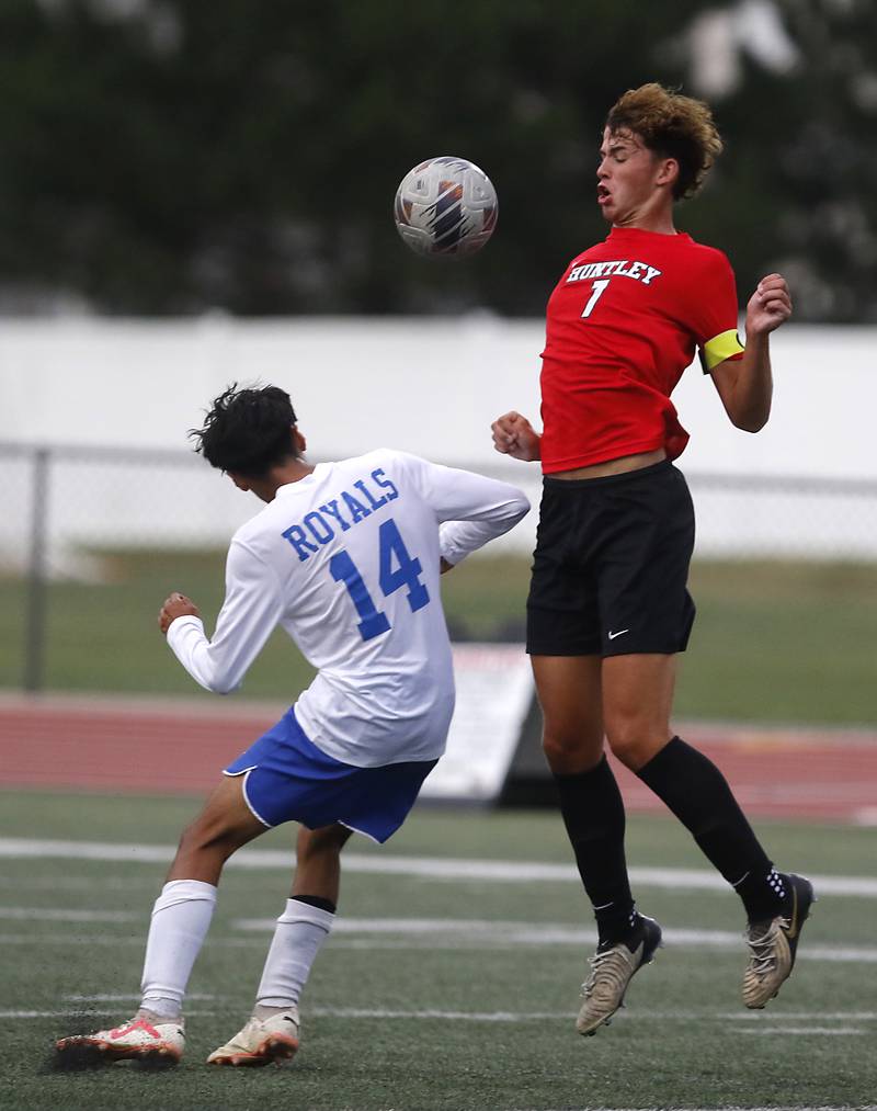 Huntley's Mason Leslie played the ball in front of Larkin's Juan Cruz during a nonconference soccer match on Thursday, Sept. 5, 2024, at Huntley High School.