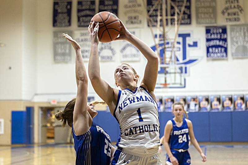 Newman’s Jess Johns puts up a shot against Princeton’s Miyah Fox Thursday, Dec. 14, 2023 at Newman High School.